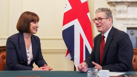 Rachel Reeves and Sir Keir Starmer sat speaking