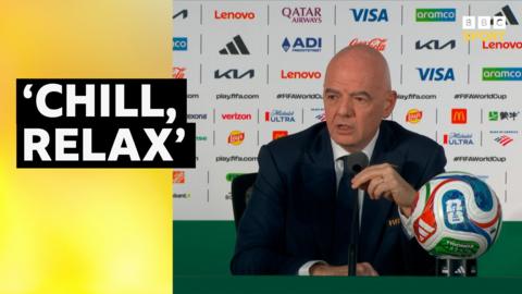 A photo of Fifa president Gianni Infantino speaking at a news conference with the quote 'chill, relax' written in graphic form next to him.