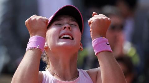 Mirra Andreeva celebrates winning the French Open women's title