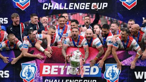 Hull KR players celebrate winning the Challenge Cup