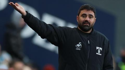 Vitor Matos gestures to his players on the touchline 