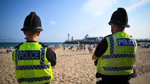 Dorset Police officers patrol Bournemouth beach