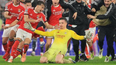 Goalkeeper Anatoliy Trubin celebrates scoring for Benfica against Real Madrid