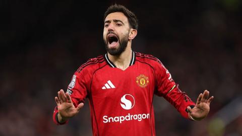 Bruno Fernandes of Manchester United gestures to calm down