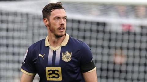 Ben Heneghan in action for Port Vale
