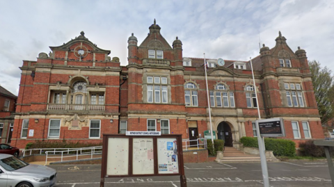 A red brick historic building.