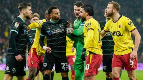 Portsmouth and Watford players argue