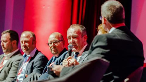 The chief minister speaking on a panel at the 2022 conference