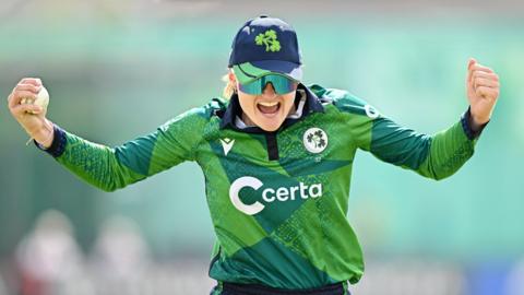 Ireland's Gaby Lewis celebrates with the ball in her right hand