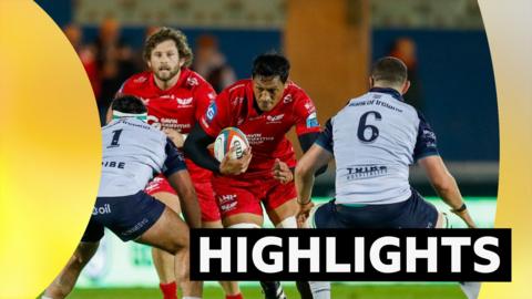 Sam Lousi attacks for Scarlets