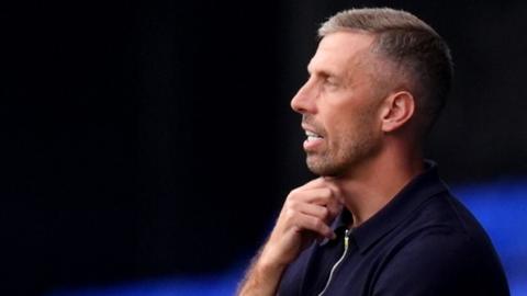 Gary O'Neil scratches his neck