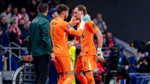 Antonin Kinsky of Tottenham Hotspur is substituted for Guglielmo Vicario after conceding three goals in the first half. 