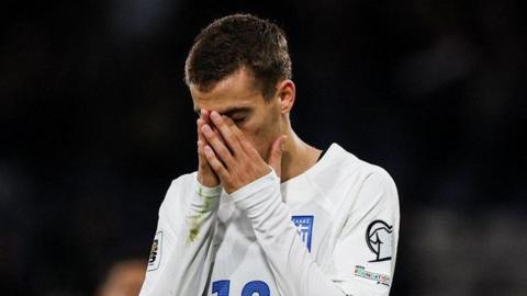 Greece's Giannis Konstantelias looks dejected