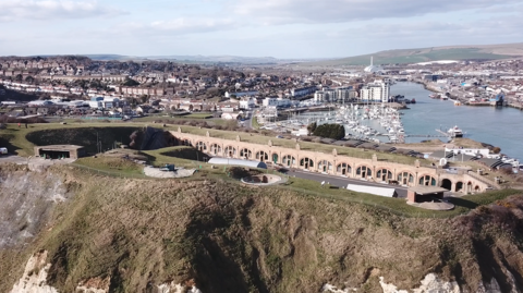 An areal view of Newhaven Fort. There is a river in the background and the town.