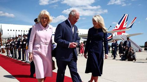 Britain's King Charles III and Queen Camilla are greeted by US Protocol Chief Monica Crowley .