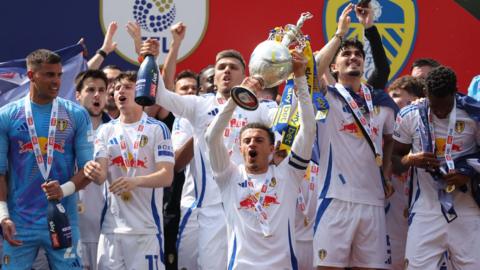 Ethan Ampadu lifts the Championship trophy