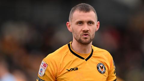 Shane McLoughlin in action for Newport County
