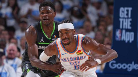 Anthony Edwards #5 of the Minnesota Timberwolves and Shai Gilgeous-Alexander #2 of the Oklahoma City Thunder 