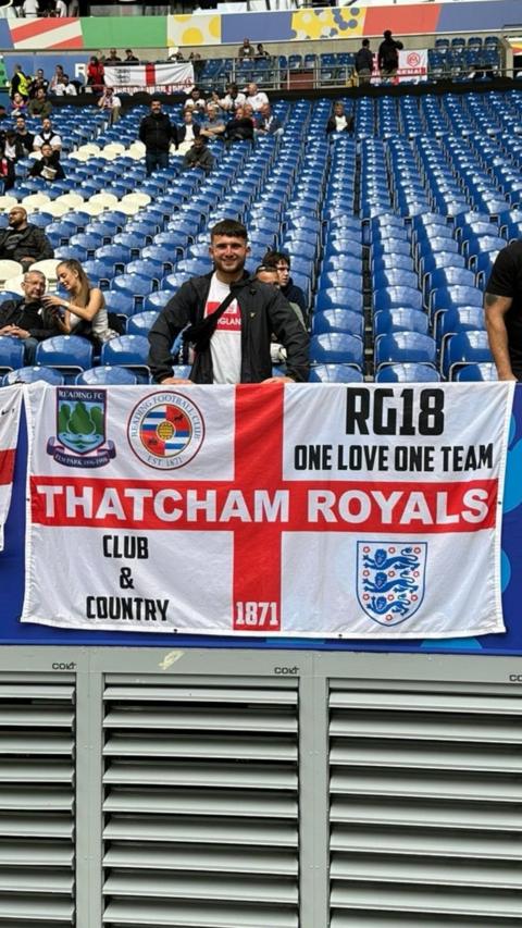 Charlie Richardson with his 'Thatcham Royals' (written across the horizontally on the St George's cross) flag at the Arena AufSchalke in Gelsenkirchen.