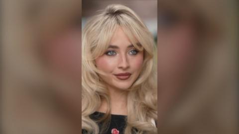 Screengrab of Sabrina during the interview, of a close-up shot of her from the shoulders up
