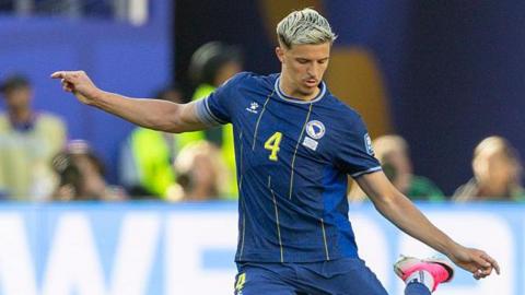 Tarik Muharemovic in action for Bosina-Herzegovina