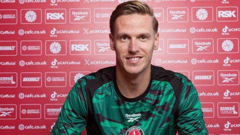 Thomas Kaminski signing his Charlton Athletic contract