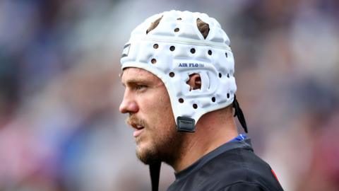 Ryan Sutton, wearing a scrum cap, playing for Canterbury in the NRL