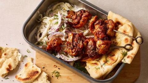 Greek chicken skewers with tzatziki slaw in a lunch box