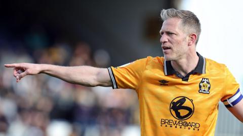 Michael Morrison in action for Cambridge