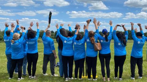 The OMAID cricket team on St Matthew's Field in Bridgwater