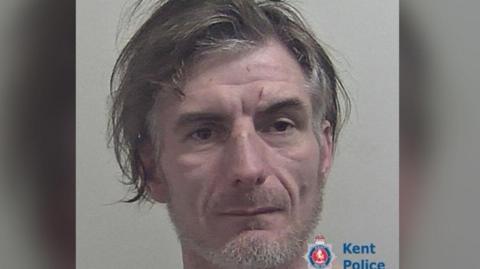 A police mugshot of Karl Kaynar.