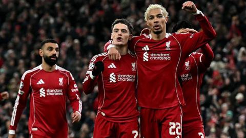 Liverpool midfielder Florian Wirtz celebrates scoring a goal with Hugo Ekitike