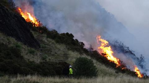 A view of a fire on Arthur's Seat in Holyrood Park, Edinburgh, on 10 August 2025