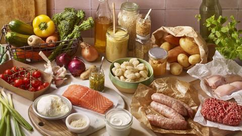 A table top covered with all the ingredients for our air fryer meal plan for two 