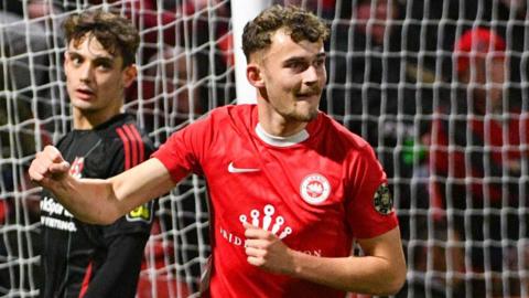 Benji Magee celebrates Larne's first goal