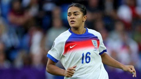 Jess Carter in action for England