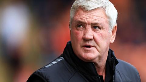 Blackpool manager Steve Bruce looks on