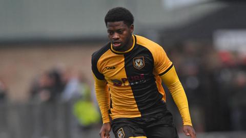 Bobby Kamwa in action