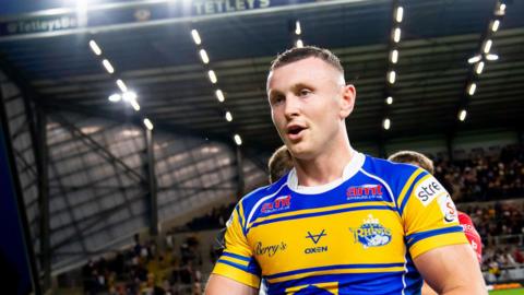 Harry Newman celebrates at the end of a Leeds Rhinos game in 2025