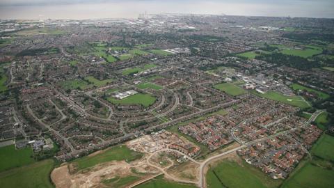 Aerial view of Grimsby showing housing looking towards the docks in the distance