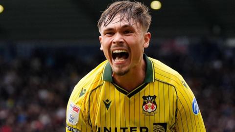 Wrexham's Callum Doyle celebrates