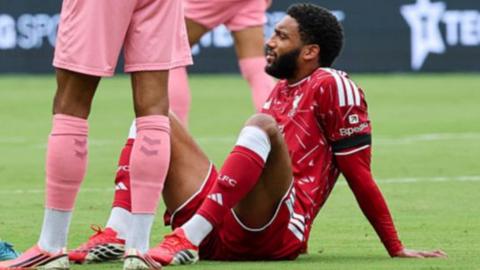 Joe Gomez down on the ground