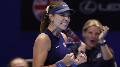 Katie Boulter celebrates Great Britain's victory over Japan at the Billie Jean King Cup