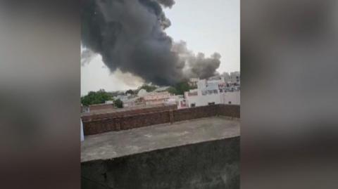 Smoke rising in Ahmedabad
