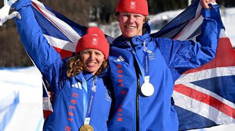 Snowboard cross mixed team event, Charlotte Bankes and Huw Nightingale win Team GB's first gold medal on snow at a Winter Olympics
