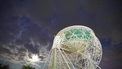 Jodrell Bank against the sky.