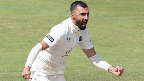 Zafar Gohar shouts in celebration after taking a wicket for Middlesex against Northamptonshire