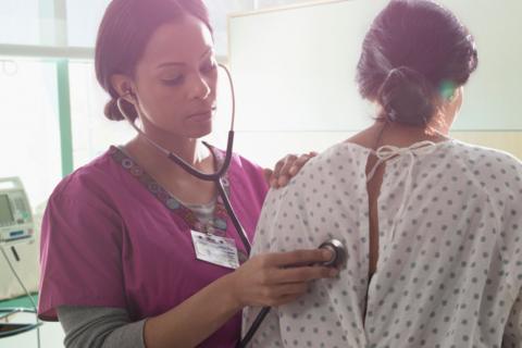 nurse checking heartbeat