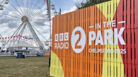Radio 2 in the Park logo with a ferris wheel behind.