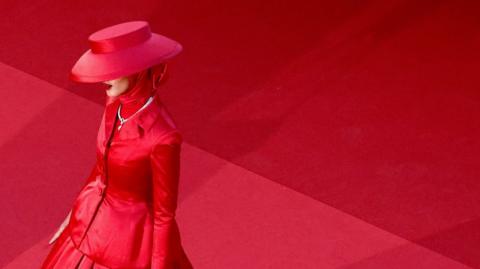 Rawdah Mohamed poses on the red carpet during arrivals for the screening of film "Marcello Mio" in competition at the 77th Cannes Film Festival in Cannes, France, 21 May 2024.